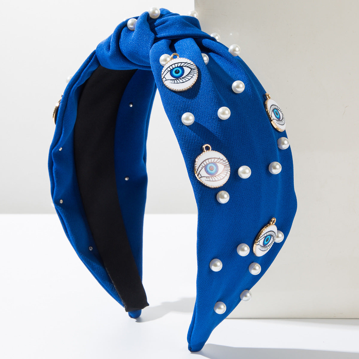 Wholesale Pearl round devil eye headband accessories